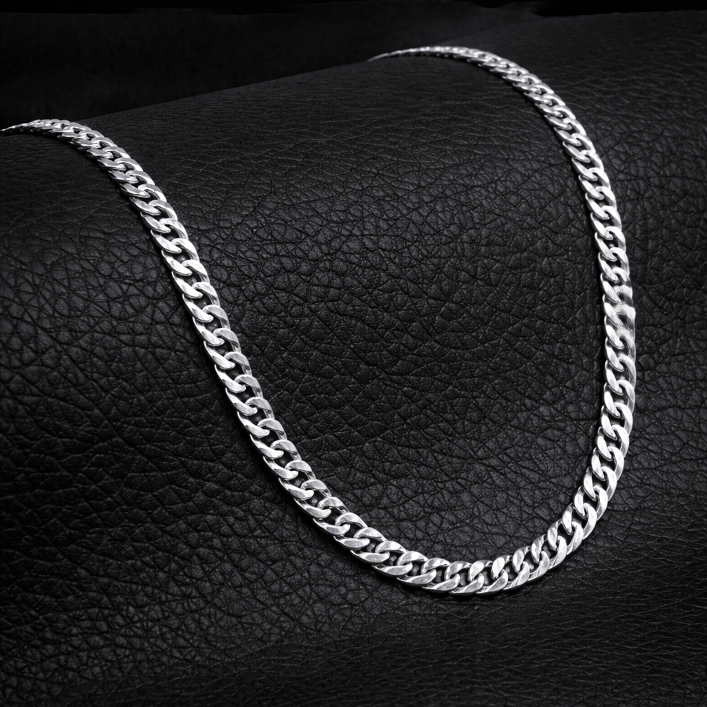 Encliff Cuban link chain with thick, interlocking gold-toned links, showcasing a stylish and durable jewelry piece.