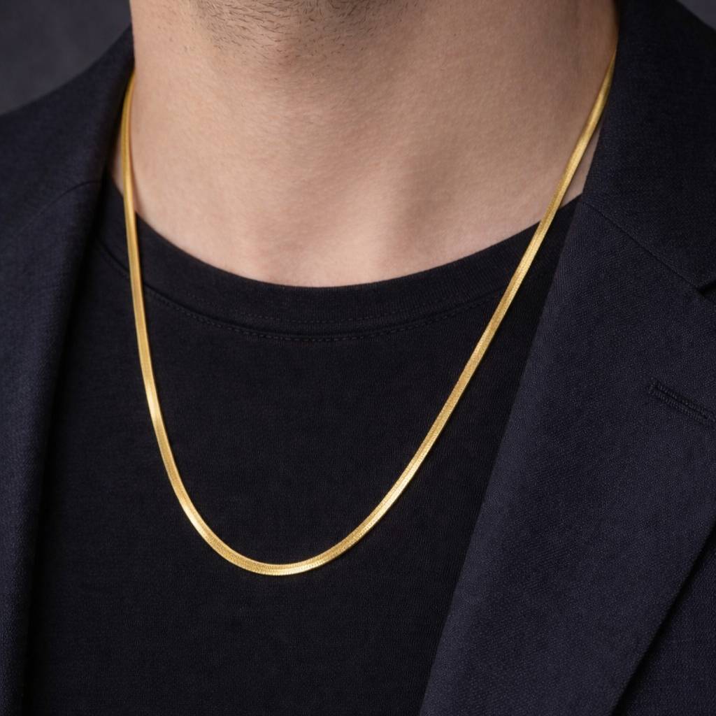 Shiny silver Encliff snake chain necklace with smooth, flexible design displayed against a white background.
